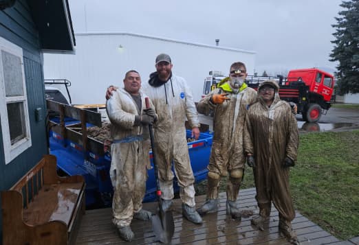 The TC BUILDS team doing flood cleanup